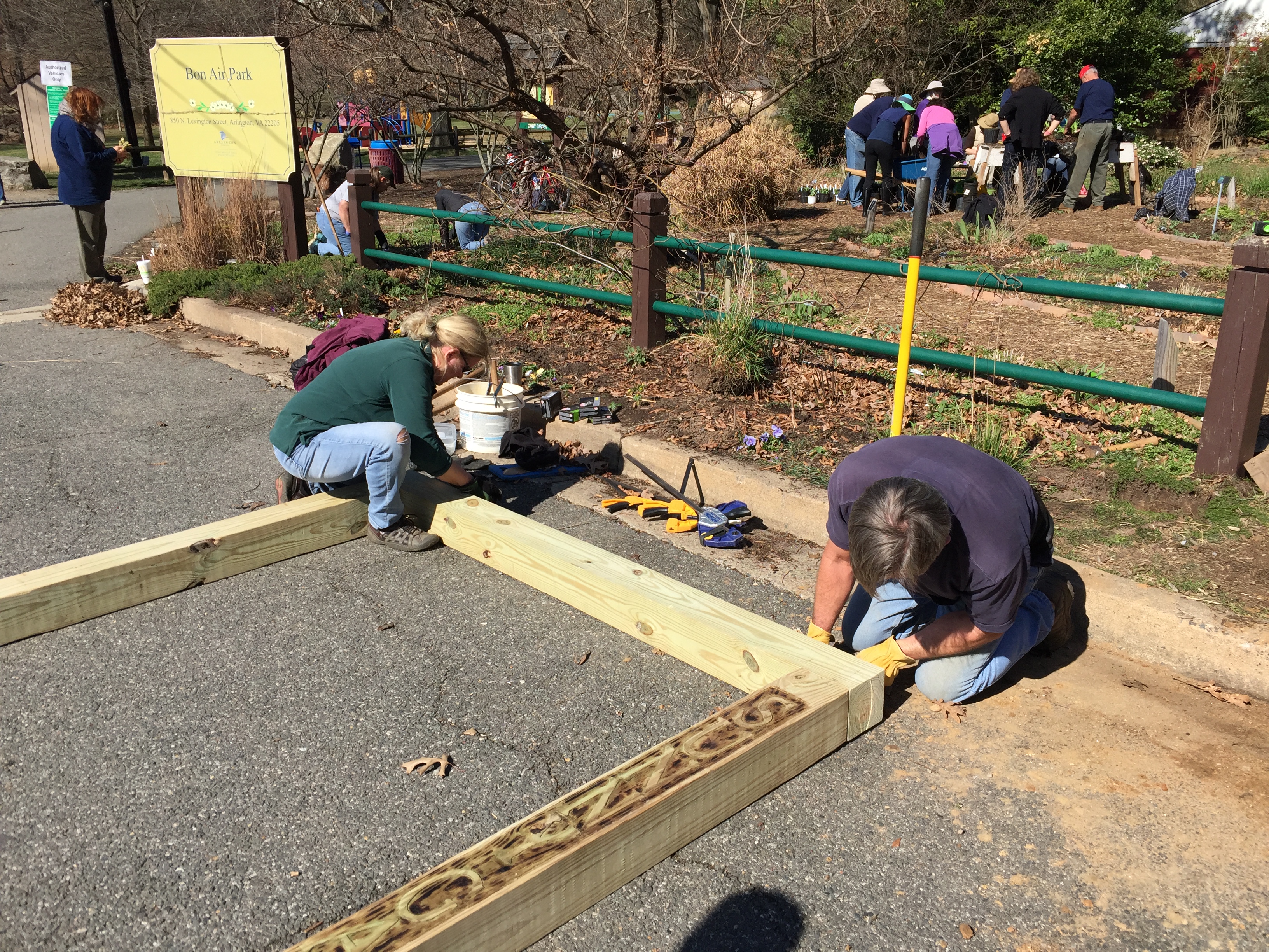 Alex and Doug Dickman assemble the arbor.