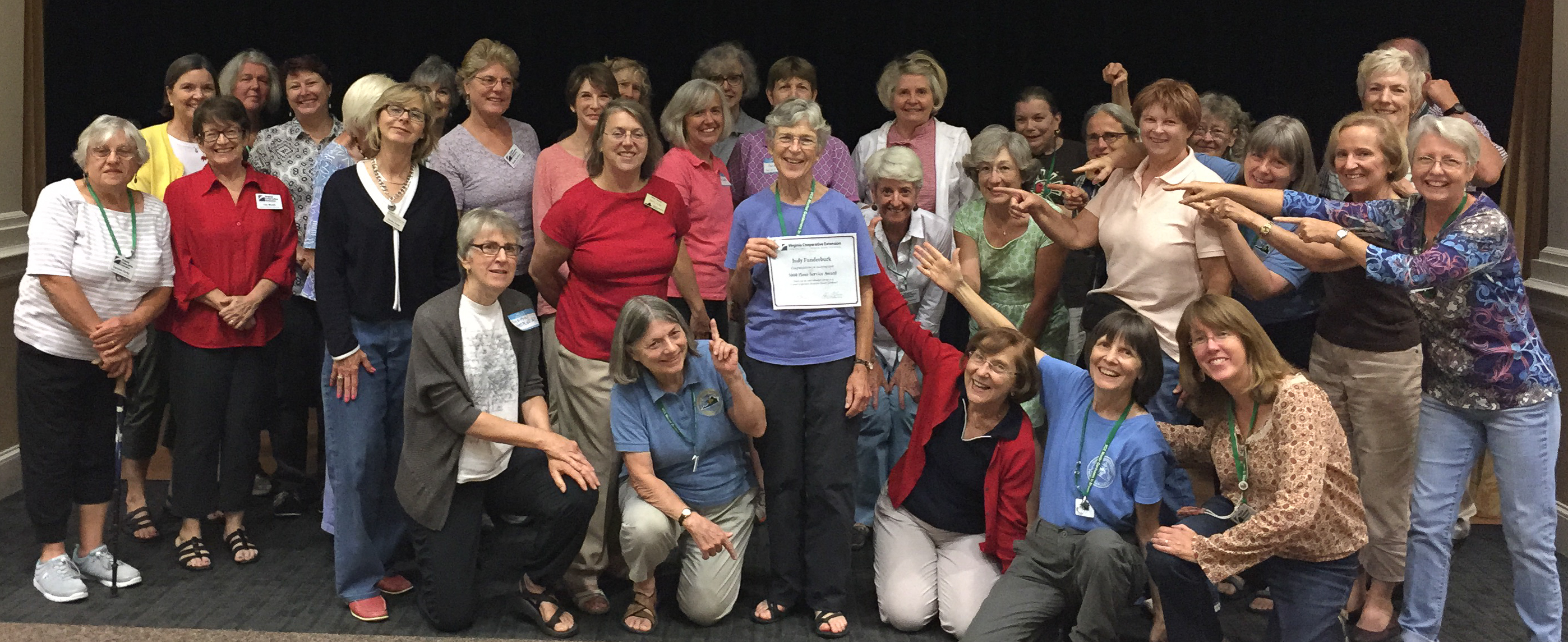 Master Gardeners celebrate Judy's 5000-hour volunteer award.
