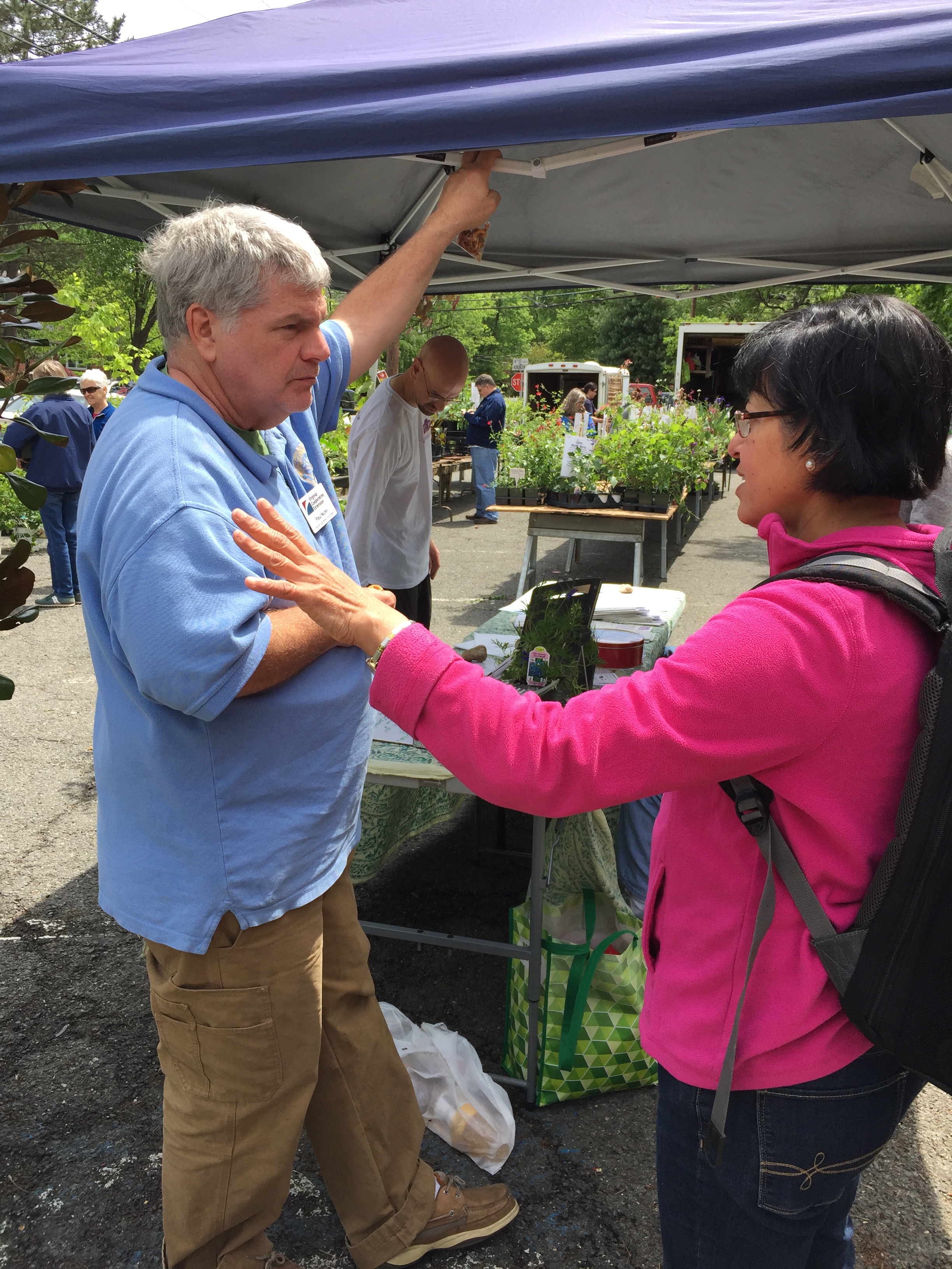 Paul Nuhn gives advice at the spring plant sale.