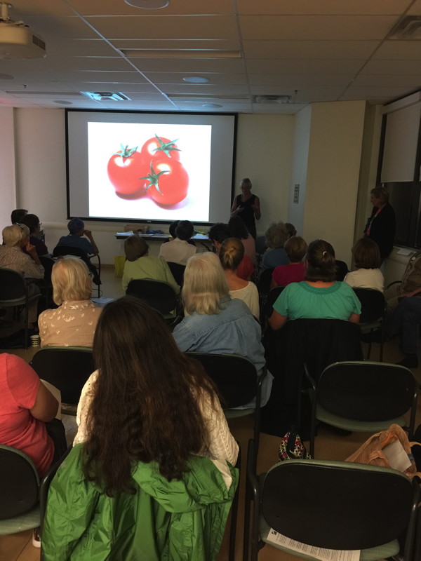 people looking at PowerPoint presentation
