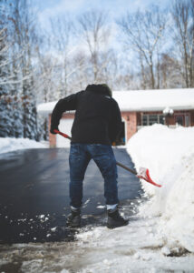 man shoveling snow