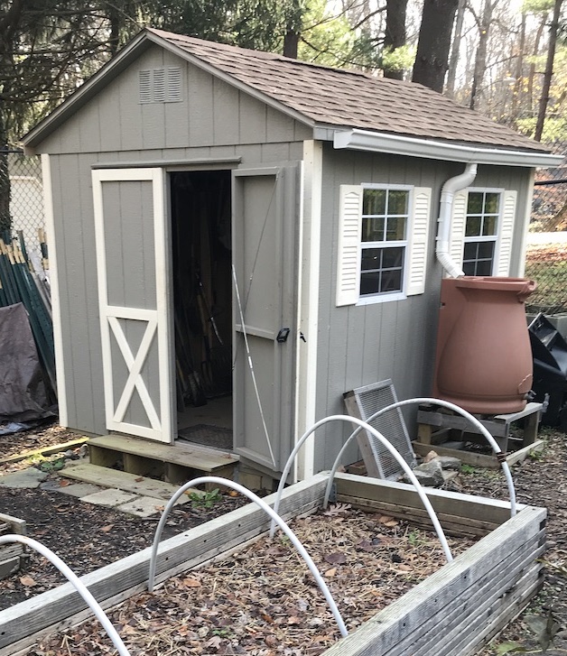 A rain barrel in use at the Organic Vegetable Garden.