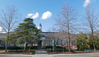 Evergreens provide winter interest in the landscape of the Fairlington Community Center in January.