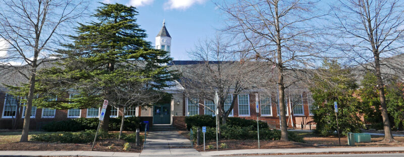 Evergreens provide winter interest in the landscape <br/>of the Fairlington Community Center in January.