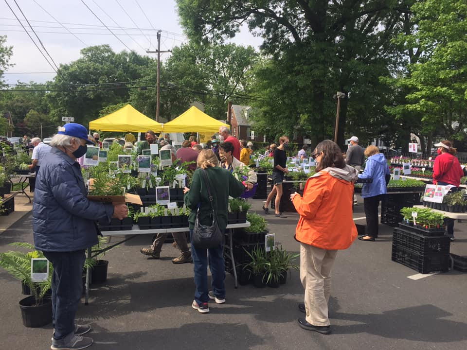Customers buying plants at a Glencarlyn Spring Celebration