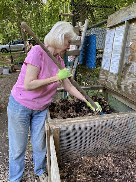 Turning over compost
