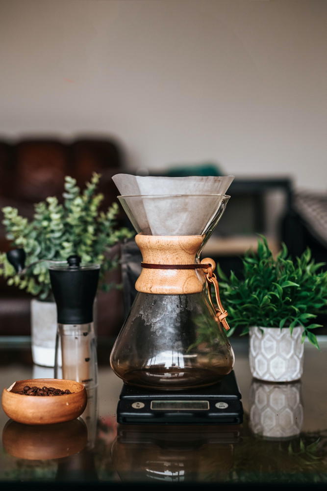 Coffee carafe surrounded by plants