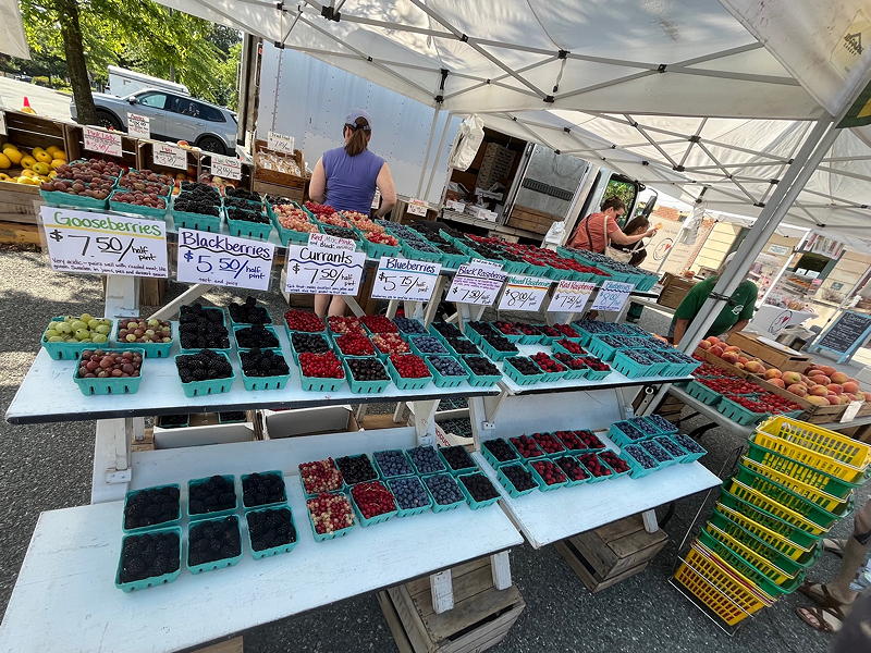 Display of berries for sale on table